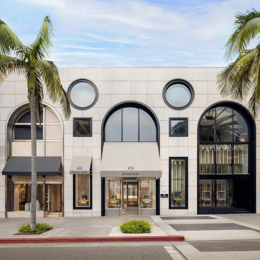 Grand Seiko boutique on Rodeo Drive, Beverly Hills, straight on from across the street between two palms