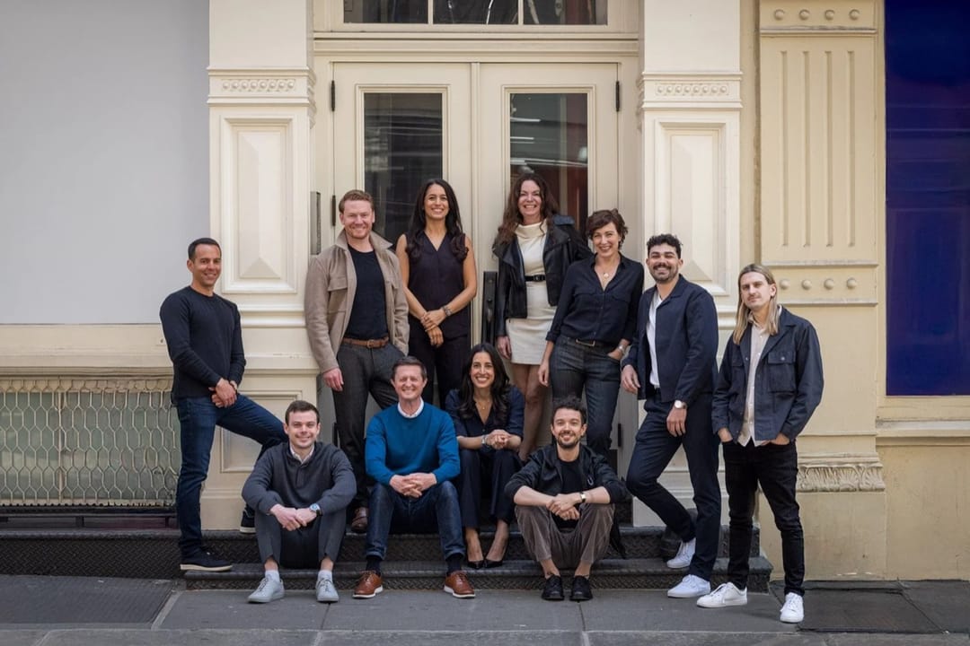 Harkov Lewis Team group portrait on a SoHo stoop
