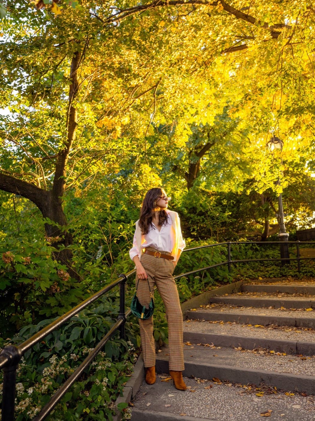 Kate Bartlett on park steps under golden fall trees, for Polo Ralph Lauren